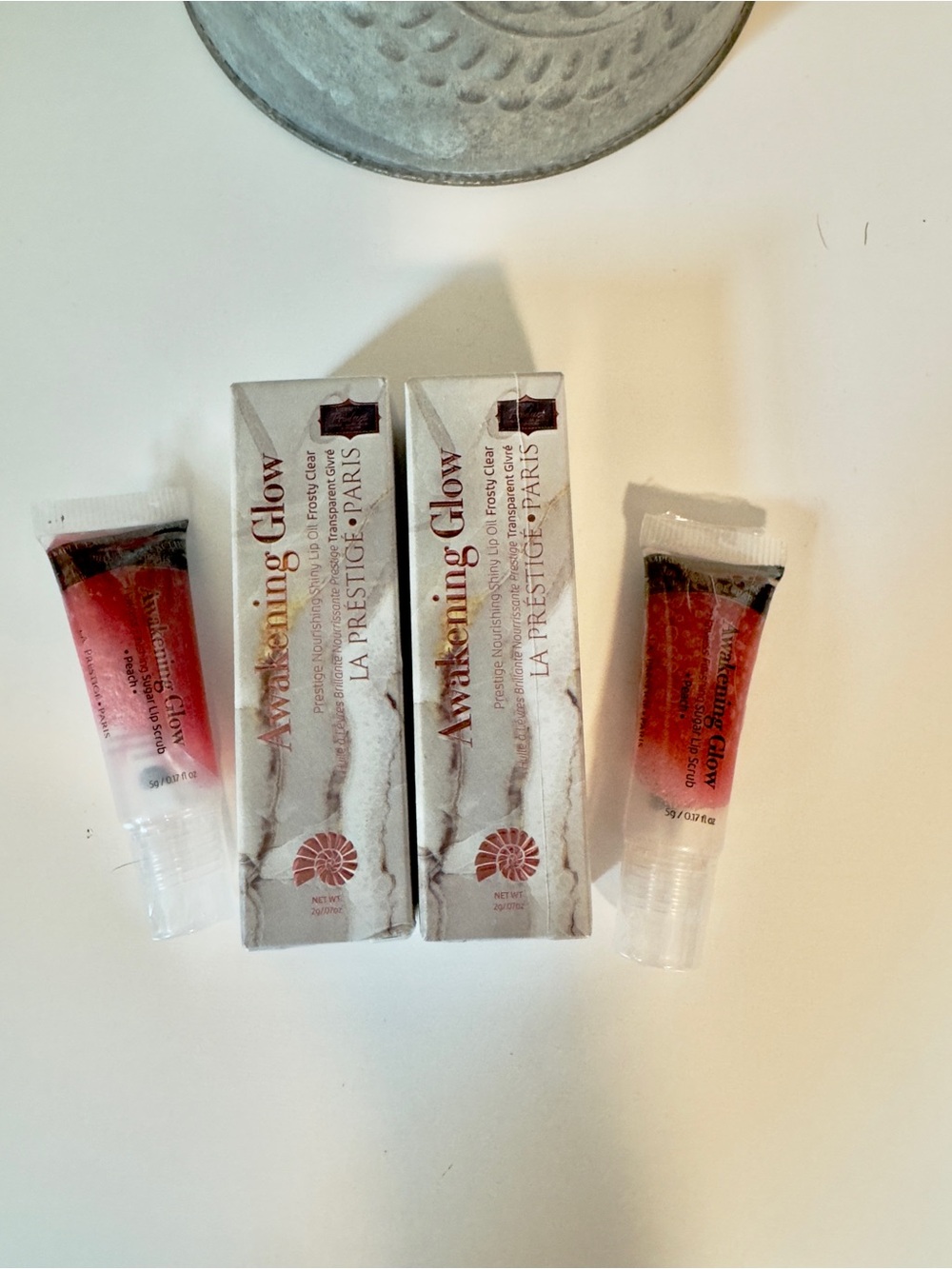 La Prestige Awakening Glow Frosty Clear Lip Oils & Peach Lip Sugar Scrubs